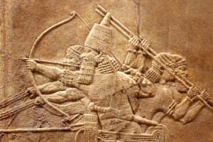 shutterstock 1291807747 Assyrian,Relief,On,The,Wall.,Ancient,Carving,On,The,Stone