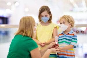 shutterstock 1661924137 Family,With,Kids,In,Face,Mask,In,Shopping,Mall,Or