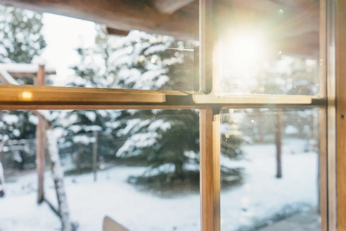 Closed insulated window during cold weather to keep pests out