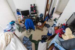 shutterstock 1377013625 Very,Messy,,Cluttered,teenage,Boy's,Bedroom,With,Piles,Of,Clothes,,Electronics,