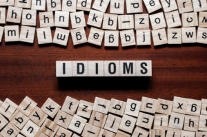 shutterstock 1386920540 Idioms,Word,Concept,On,Cubes