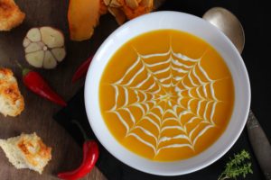 shutterstock 501737263 Fresh,Pumpkin,Soup,With,A,Picture,Of,A,Spider,Web,