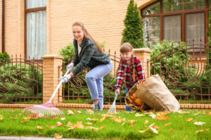 shutterstock 1621912234 Mother,And,Daughter,Cleaning,Up,Autumn,Leaves,Outdoors