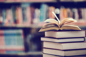 shutterstock 1274296330 Book,In,Library,With,Open,Textbook,education,Learning,Concept