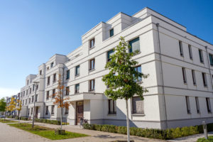 shutterstock 1898949190 Street,With,Modern,White,Townhouses,In,Berlin,,Germany
