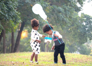 shutterstock 1908100765 African,American,Boys,And,Girls,Catch,Insects,In,The,Forest