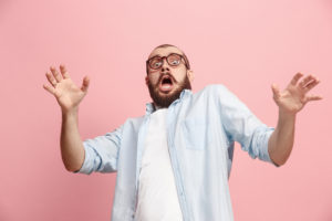 shutterstock 1030053121 I'm,Afraid.,Fright.,Portrait,Of,The,Scared,Man.,Business,Man