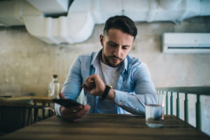 coffee termite Serious,Caucasian,Male,Looking,At,Wearable,Clock,Managing,Time,On