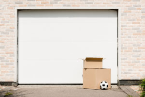 attraction cardboard Front,View,Of,Boxes,,Soccer,Ball,In,Front,Of,Garage