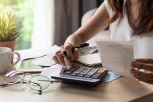 consequences cover Stressed,Young,Woman,Calculating,Monthly,Home,Expenses,,Tax,,Bank,Account