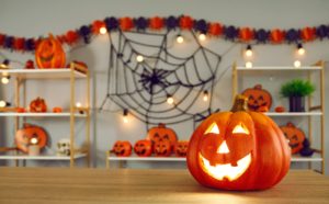 halloween cover Big,Pumpkin,With,Carved,Funny,Glowing,Face,Standing,On,Background