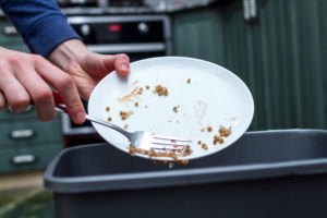 thanksgiving trash Close,Up,Of,A,Person,Throwing,From,A,Plate,The