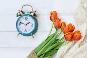 daylight savings cover Alarm,Clock,With,A,Beautiful,Bouquet,Of,Tulips,And,A