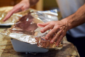 pool party coverings Hands,Covering,Casserole,Dish,With,Aluminum,Foil,To,Back,In