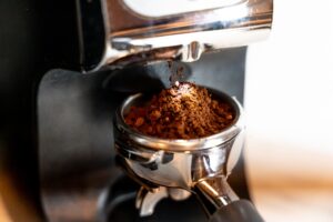 natural coffee Coffee,Grinder,With,Portafilter,And,Ground,Coffee,Black,And,Silver