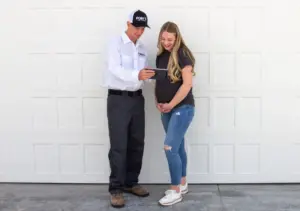 Pointe Pest Control Technician and a happy customer