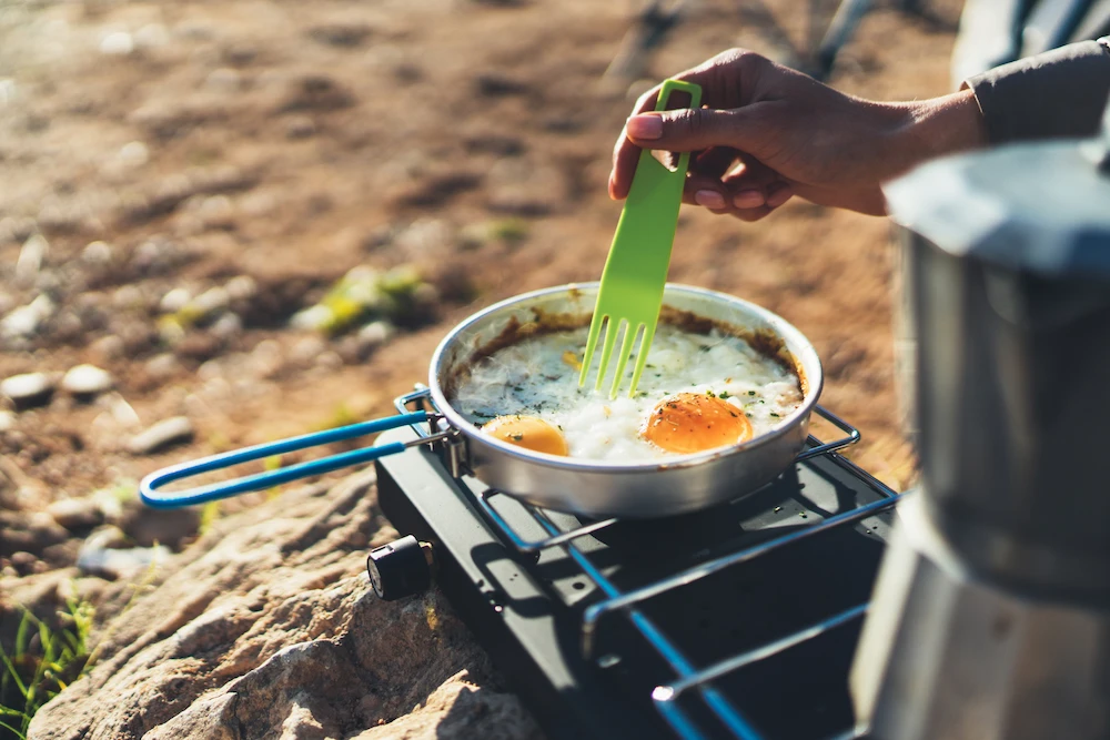 cooking eggs on camp stove